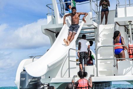 Bavaro Punta Cana boat party with drinks and transportation