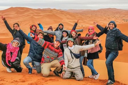 Dubai Desert Safari Camel Ride Sand Boarding BBQ Dinner