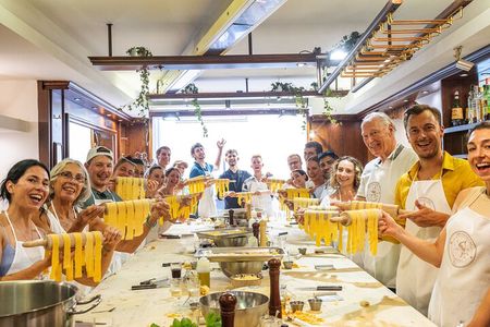 Florence: Flambé Cheese Wheel Truffle Pasta Class & Tiramisù