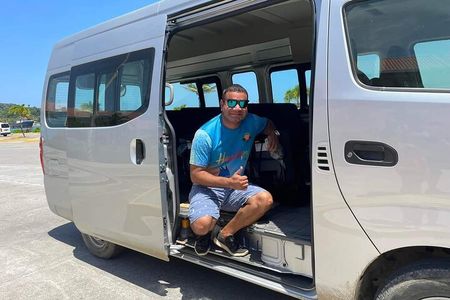 Roatan Private 12 setter Bus with Driver for the day