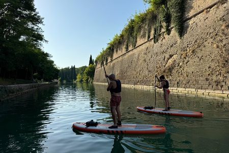Sup experience with a ride to Peschiera del Garda Lake Garda