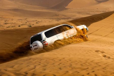 Vip Red Dune Safari with 4x4 Pick & Drop, Camel Ride, BBQ Dinner
