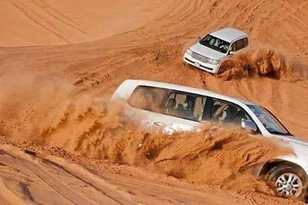Half Day Night and Morning Desert Safari Camel and Sand Boarding 