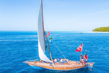 Full-day Dhow Sailing trip to Mnemba sandbank with snorkeling