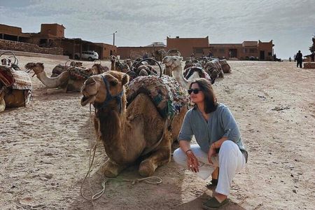 Sunset Camel Ride experience in the Agafay rocky Desert.