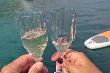 Sunset aperitif on a sailing boat in Alghero
