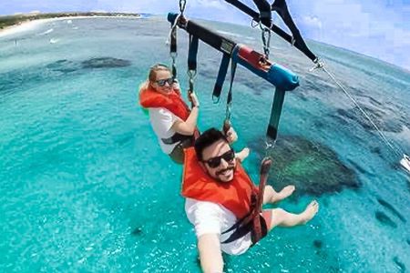 Parasailing above Turquoise Ocean Waters in Montego Bay 