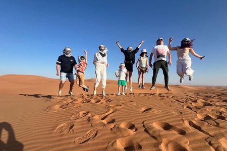 Dubai Desert Safari: Quad Bike, Sandboard, Camel Ride and BBQ