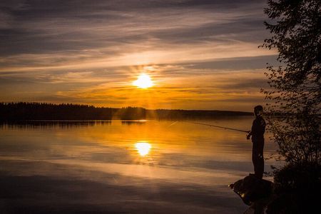 Rovaniemi Fishing Trip with Fish Soup and Campfire Experience 