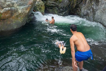 Toro Negro River Hike & Cliff Jumping Adventure; San Juan Pick Up
