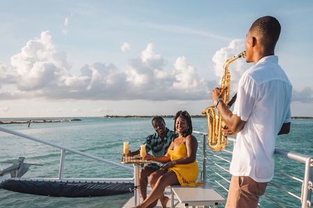 Luxury Catamaran Sunset Sail with Saxophone on Princess Grace