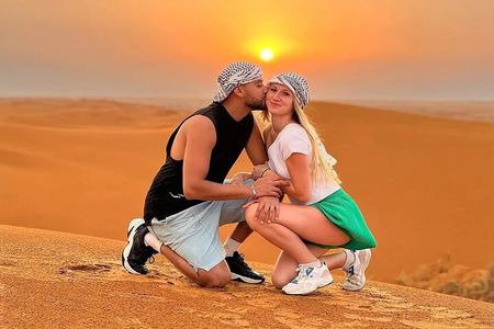 Morning Desert Adventure Dubai: Camel Ride Sandboard Falcon Photo