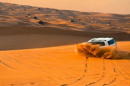 Luxury Desert Safari with Dune Bashing Camel Rides and BBQ Dinner