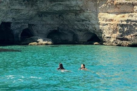 Boat tour from Monopoli to the Polignano caves with aperitif 