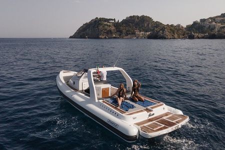 White Lotus Taormina and Giardini Naxos Boat Tour 4h