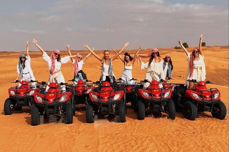Desert Quad Biking Tour and Sand Boarding with Dinner in Dubai