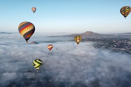 Hot Air Balloon Flight with Breakfast in Cave and Transportation