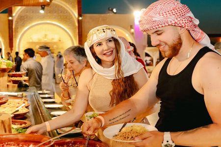 Premium Desert Safari with Quad Bike Red Dunes Camel Ride Dinner
