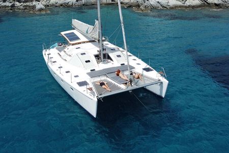 Mykonos Catamaran Cruise Day or Sunset Tour with Meals and Drinks