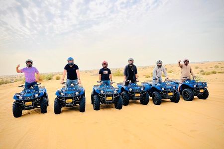 4 Hours Desert Tour with Quad Bike Camel Ride & Sandboard