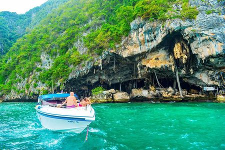 Phi Phi Islands Speedboat Tour with Snorkeling and Sunset Swim