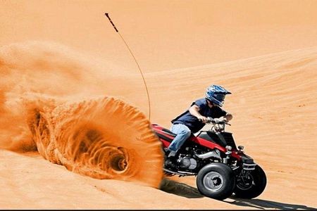 Doha : Quad Bike Desert Safari With Sandboarding & camel ride