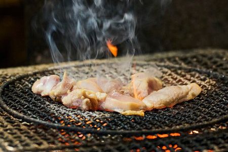 Osaka: Guided Food Tour with 12 Dishes at 4 Local Eateries