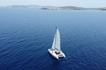 Mykonos Catamaran Cruise Private Tour with Meals and Drinks