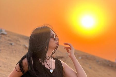 Arabian Desert safari + Quad Bike + Camel Ride + Sandboarding 