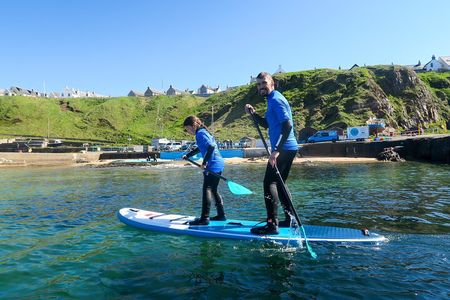Stand Up Paddleboarding Lesson in Historic Portknockie Harbour