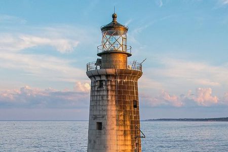 Sunset Lighthouse Cruise Along Casco Bay