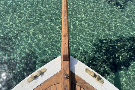 Private Cruise: Explore Rina’s Cave & Enjoy Fresh Seafood Onboard