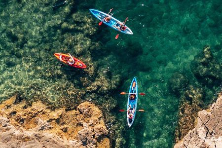 Pula: Three Islands Kayak Tour – snorkeling & cave photo stop