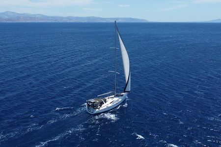 South Paros Antiparos Faragas Beach Sailboat Yin Yang Concept