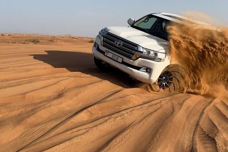 Dubai Half-Day Desert Tour: Camel Ride, Quad Bike