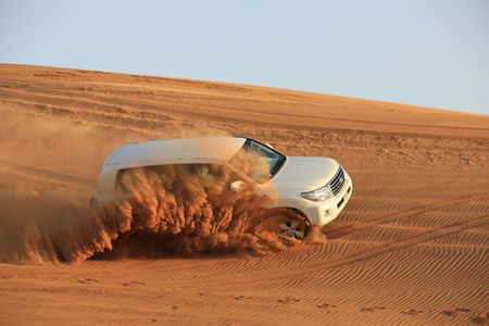 Abu Dhabi: Desert Safari with Dune Bashing, SandBoarding & BBQ