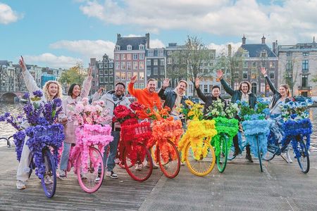 Explore Amsterdam canals on iconic Flower Bikes