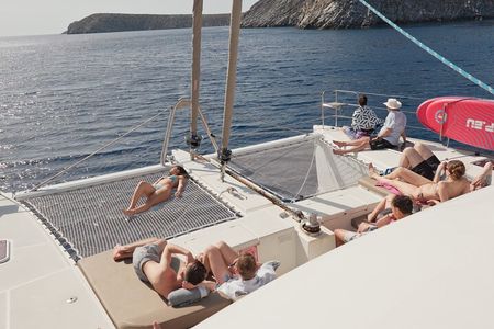 Catamaran Cruise to Dia Island with Meal and Water Activities