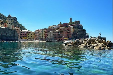 Private tour to Cinque Terre on a traditional Ligurian gozzo boat.