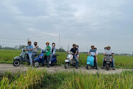 Exploring Vespa Tour Through Little Red River Delta