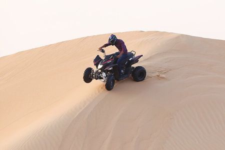 Explore Dubai Desert by Private Quad Bike Tour with pick and drop