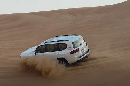 Evening Desert Safari Dubai Dune Bashing Camel Ride and BBQDinner