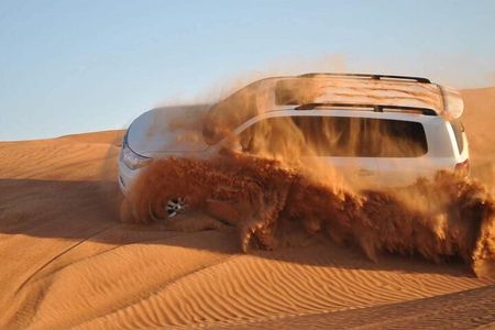 Dubai Desert Safari Dune Bashing, Camel Ride, and BBQ Dinner