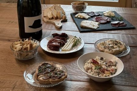 Wines and cold cuts and cheeses in the cellar