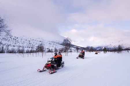 Midday Snowmobiling in Camp Tamok with Guide