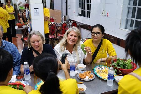 Saigon Night Street Food and City Tour on Scooter