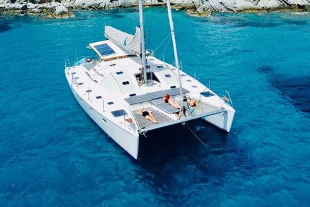 Mykonos Catamaran Cruise Day or Sunset Tour with Meals and Drinks