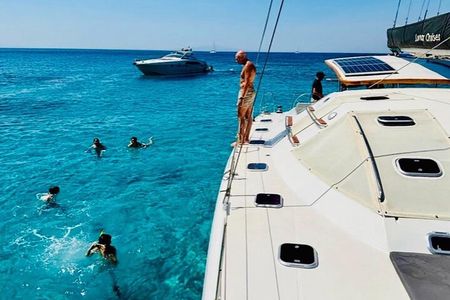 Mykonos Catamaran Cruise Day or Sunset Tour with Meals and Drinks