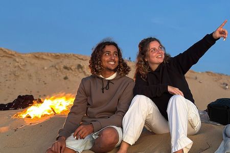Sunset on the Dunes and Sandboarding