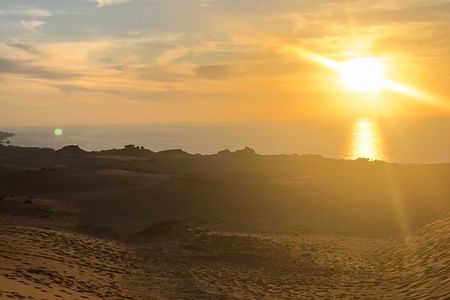 Sunset on the Dunes and Sandboarding